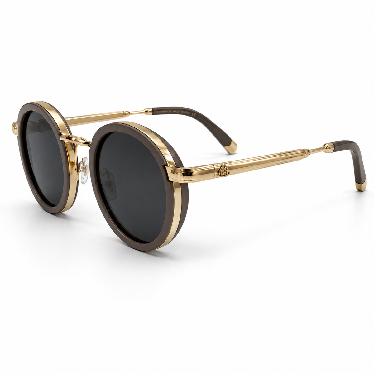 Maybach round sunglasses - three-quarter view showing gold fluted temples and Maybach crest hinge